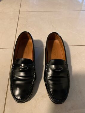 Tod's Black Leather Penny Loafers with Signature Oval Logo